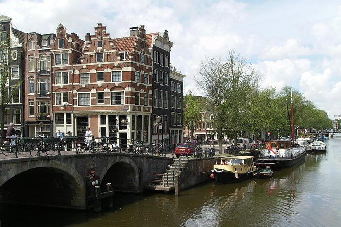 1,5 hours Amsterdam Rickshaw Tour - The route focus: UNESCO Canal Ring plus canal-bridge photo moments