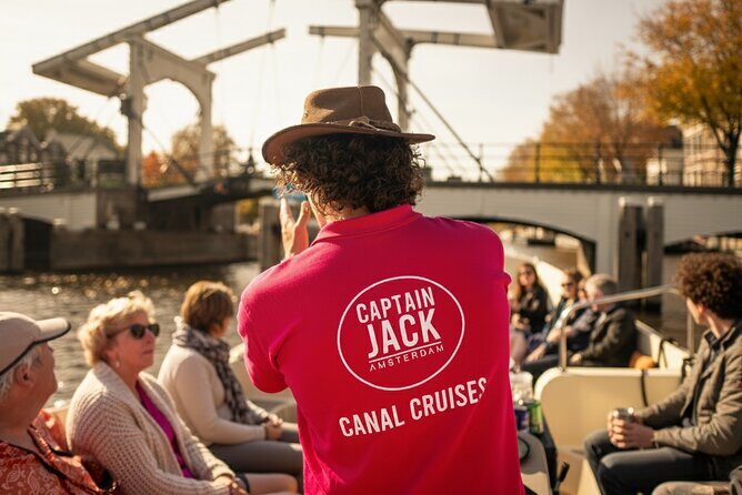 Amsterdam 1-Hour Canal Cruise With Live Guide - Jordaan vibes, houseboats, and the wooden bridge look