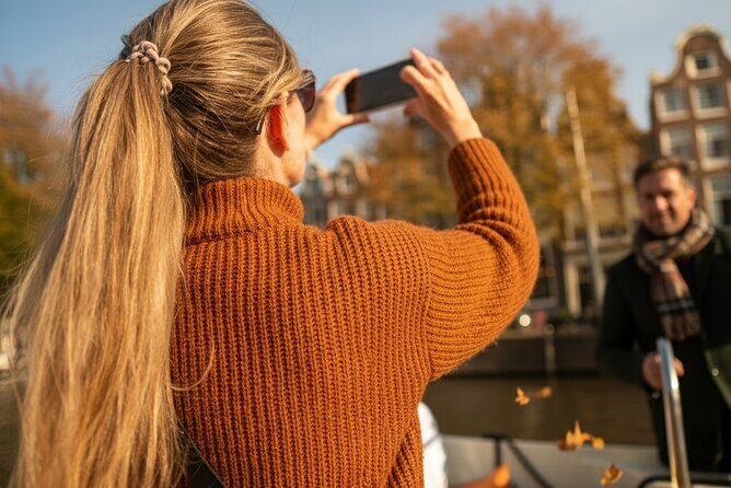 Amsterdam 1-Hour Canal Cruise With Live Guide - Amstel stretch: opera, churches, and the city at play