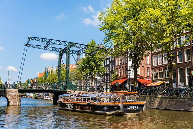 Amsterdam 1h Canal Cruise by Semi-Open Boat with Audio Guide - Semi-open, solar-powered cruising: what the boat does for you