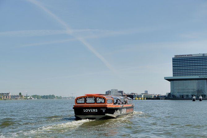 Amsterdam 1h Canal Cruise by Semi-Open Boat with Audio Guide - Comfort, weather, and crowd reality on a small boat