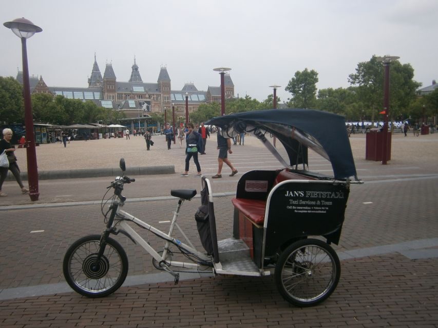 Amsterdam: 2-Hour Sightseeing Tour by Rickshaw - Red Light District Pass-By: Seeing It Without Getting Stuck