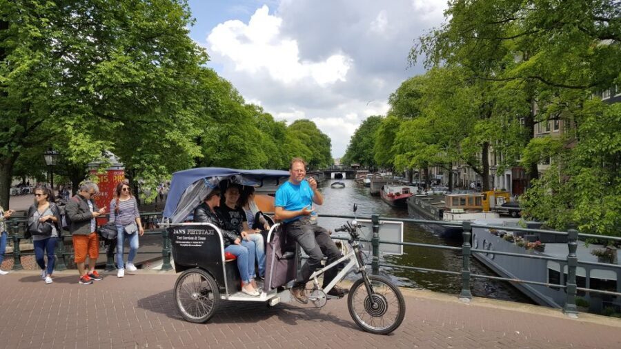 Amsterdam: 2-Hour Sightseeing Tour by Rickshaw - Practical Tips for a Smooth Ride (and Better Photos)