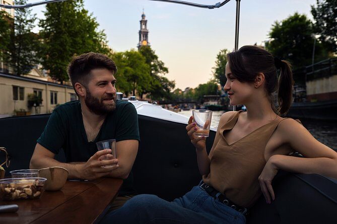 Amsterdam: 60-Minute Guided Private Canal Cruise with Drinks - On board: what’s included, and what that changes for your day