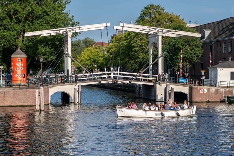 Amsterdam: 75 minute Open Boat Canal Cruise with Live Guide - Stop-by-Stop Highlights: From Westerkerk to Centraal to the Canal Belt