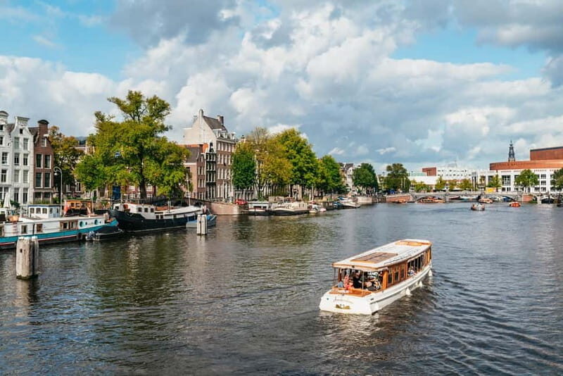 Amsterdam: Bike Tour with Optional Cruise in Small-Group - Guide energy: Spanish and English, and the ride stays controlled