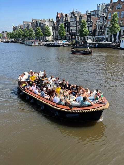 Amsterdam: Boat Tour with Optional Unlimited Drinks - Drinks, music, and the glass-roof photo advantage