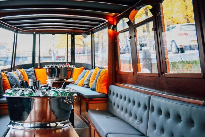 Amsterdam Canal Cruise in Classic Salon Boat With Drinks and Cheese - The Commentary: What You Get Beyond Pretty Views