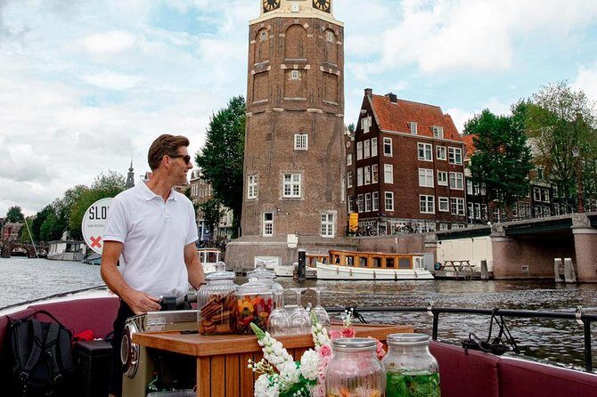 Amsterdam canal cruise in open boat – Guided tour - Central Station’s front: where modern Amsterdam meets history