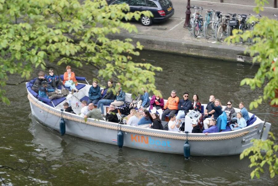 Amsterdam: Canal Cruise in Open Boat with Drink Option - Your one-hour route: stops from Westerkerk to the Dancing Houses