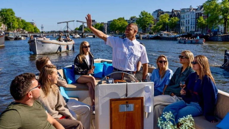 Amsterdam: Canal Cruise in Open Boat with Drink Option - The open-boat ride and that 100% electric engine hum
