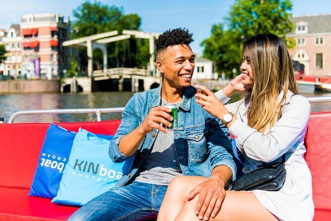 Amsterdam Canal Cruise in Open Boat with Unlimited Drinks Option - Guides, Captain Energy, and Where to Sit for Good Sound
