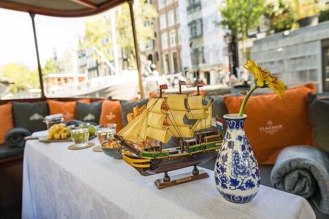 Amsterdam Canal Cruise with Cheese and Wine - Bridges in Motion: Blue Bridge, Skinny Bridge, and Drawbridge Stories