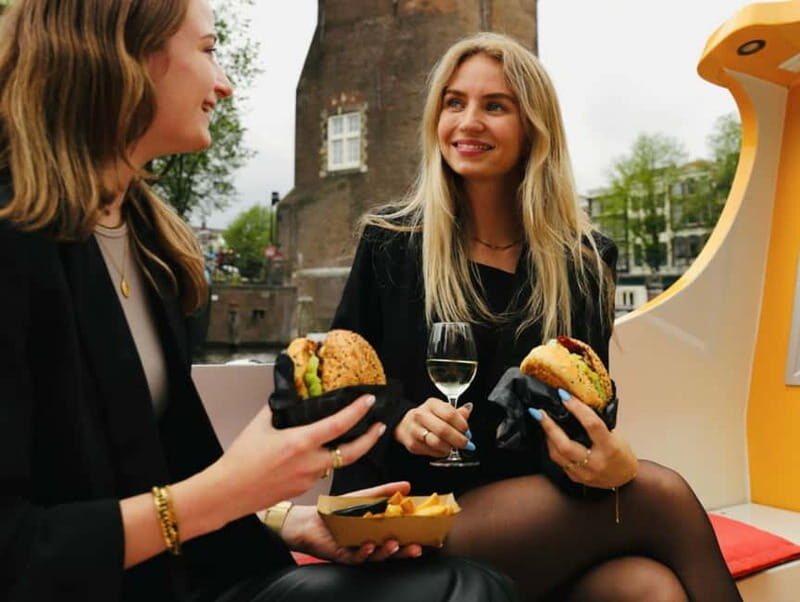 Amsterdam canal cruise with culinary burger or cheese & wine - Onboard Comfort That Actually Helps on a Cold Canal Night