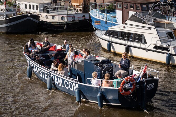 Amsterdam Canal Cruise with Live guide & Two drinks - Central St. - Key highlights worth your time