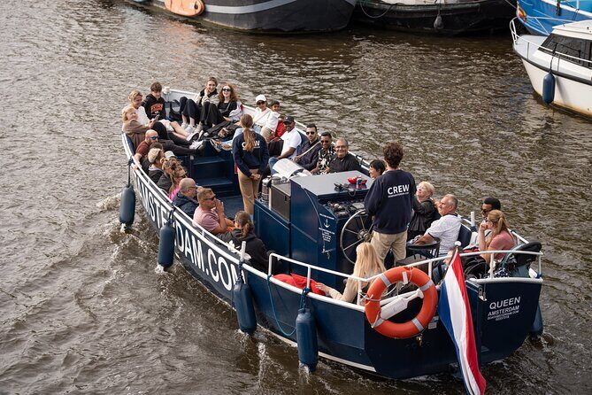 Amsterdam Canal Cruise with Live guide & Two drinks - Central St. - Two Drinks, Restroom Access, and Small-Group Comfort