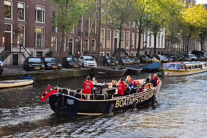 Amsterdam Canal Cruise with Open Bar - Central Station - Weeping Tower, Montelbaanstoren, and Other Photo Stops With a Story
