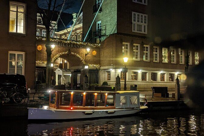 Amsterdam Champagne Private Canal Cruise - Passing the sights: Magere Brug and the rhythm of the route
