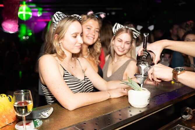 Amsterdam: City Centre Bar Crawl and Nightlife Experience - Where the night starts: Rembrandtplein and those red-shirt hosts