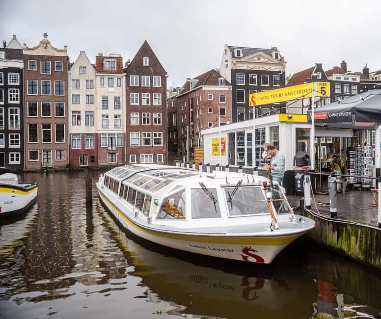 Amsterdam: City Centre Canal Cruise & Free Flower Cocktail - Audio guide and language options: do you need headphones