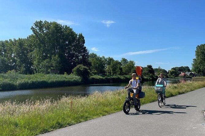 Amsterdam Countryside Bike and Kayak Tour - Watergang in Two Parts: Biking Break, Wetland Kayak, and a Church Pause