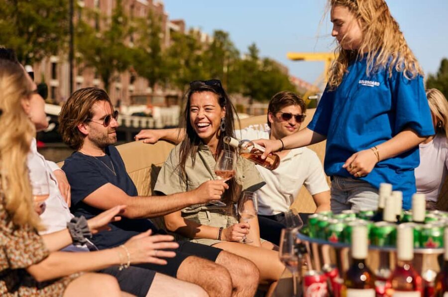 Amsterdam: Cozy Evening Canal Cruise With Open Bar Option - From the Red Light District waters to the Sea Palace and NEMO area