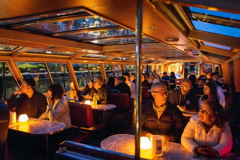 Amsterdam: Evening Cruise with Optional Wine and Snacks - The 90-minute UNESCO canal circuit: what you’ll see, and where to look