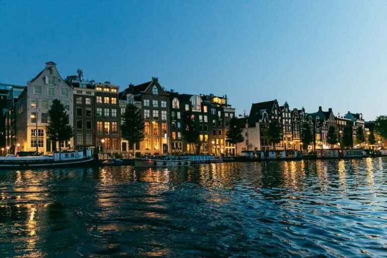 Amsterdam: Evening Cruise with Optional Wine and Snacks - Getting to the dock: Stadhouderskade and the Hard Rock Cafe landmark