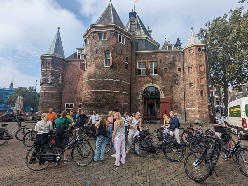 Amsterdam: Explore the City Highlights by Bike - Biking culture moments: skinny bridge vibes and practical tips
