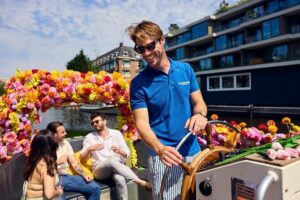 Amsterdam Flower Boat Canal Cruise with Local Guide - Price and what you get in 60 minutes