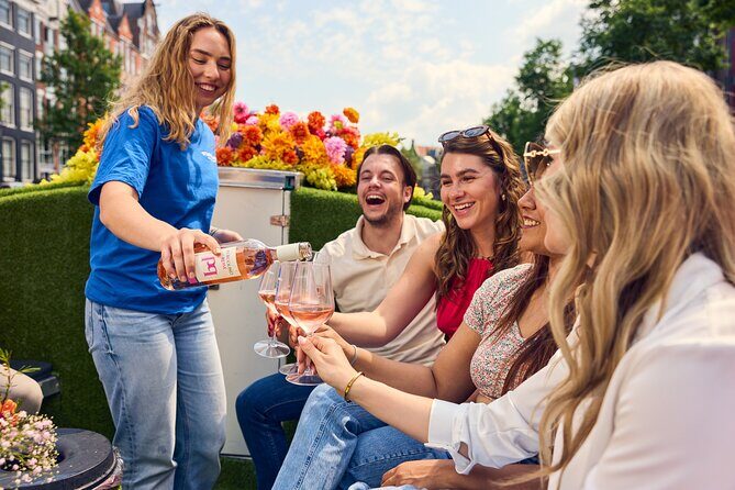 Amsterdam Flower Boat Canal Cruise with Local Guide - The cruise route: Amstel, Herengracht, and the seven bridges moment