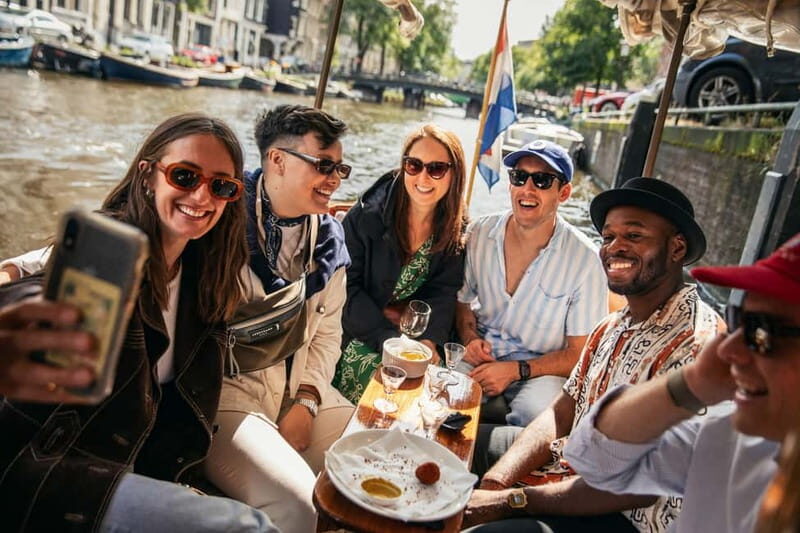 Amsterdam: Food and Canal Tour - The walking part: Dutch food culture plus real Amsterdam context