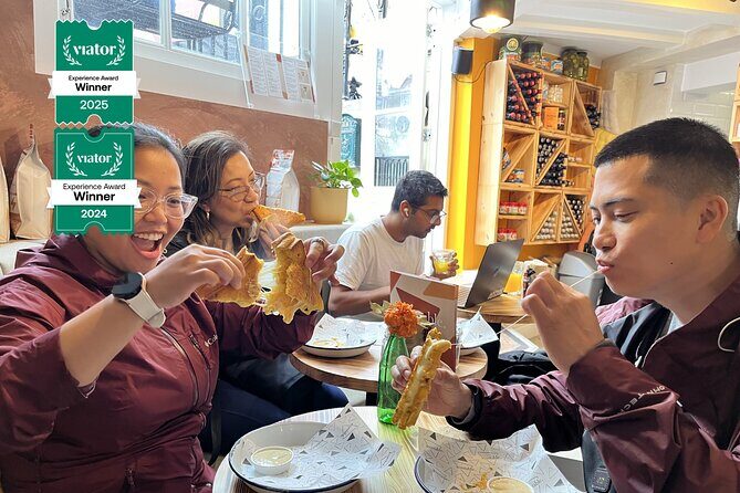 Amsterdam Food and Cultural Tour with Tastings - Bloemenmarkt Stop: Flowers, Quick Stops, and Dutch Daily Life