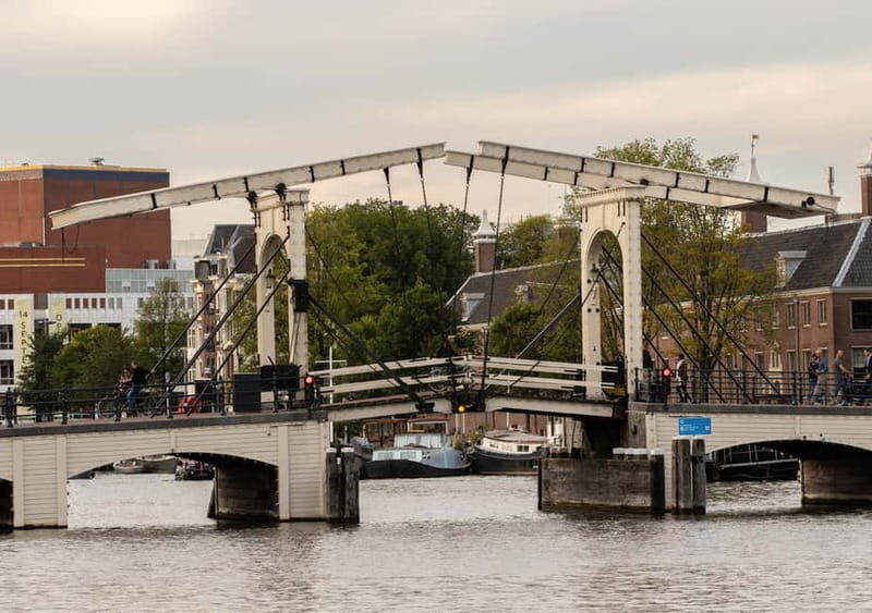 Amsterdam: German Canal Cruise with Unlimited Drinks Option - Canal-belt sights you’ll recognize fast (even on a short schedule)