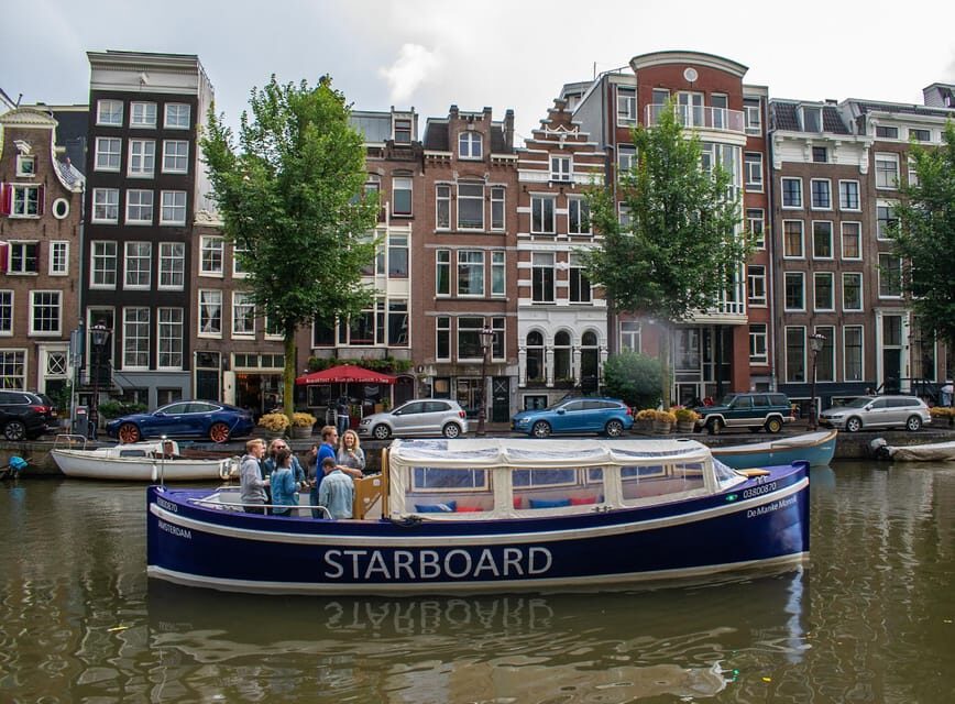 Amsterdam: German Guided Canal Cruise with on Board Bar - Stadsherstel, Prinsengracht, and the Magere Brug Moment
