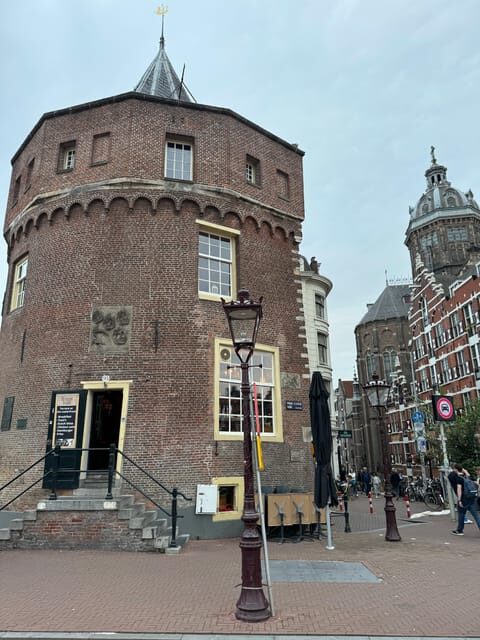 Amsterdam: Ghost Walking Tour and Dark History - Begijnhof: calm courtyards and the darker layer underneath