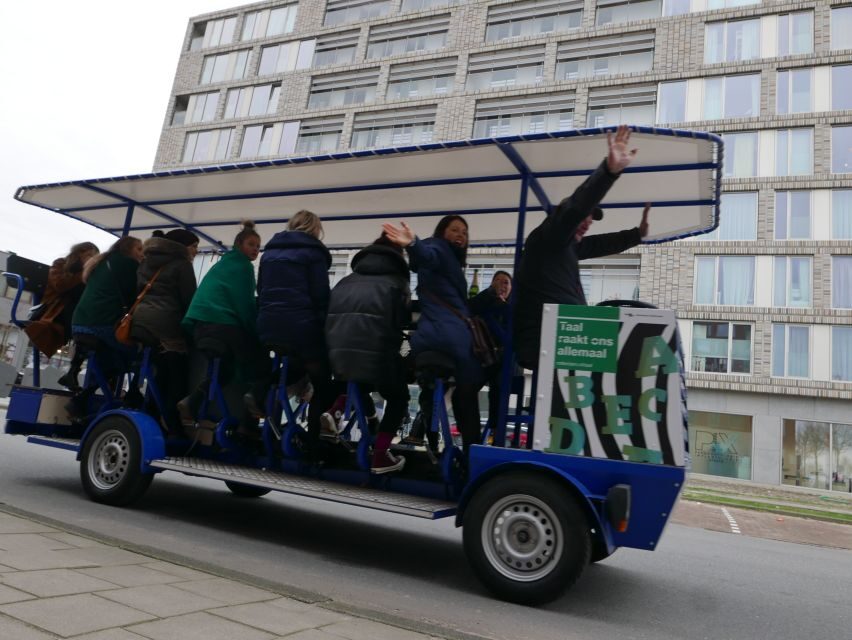 Amsterdam: Guided Beer or Prosecco Bike Tour - Riding Amsterdam without the city center: what to expect from the route