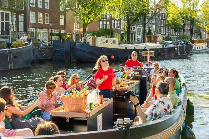 Amsterdam: Guided Open Boat Canal Cruise Unlimited Drinks Option - Key highlights you’ll feel on the water