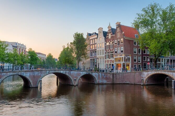 Amsterdam: Haunted History and Ghost Walking Tour - Stop-by-stop: Dam Square to Nieuwe Kerk crypts and ceremonies