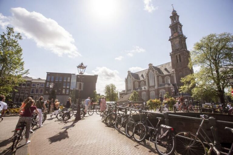 Amsterdam: Hidden Gems & Highlights Guided Bike Tour - The value of paying for bike rental + a local guide