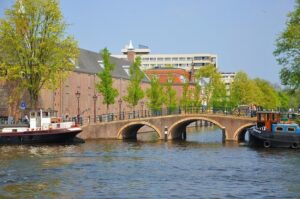 Amsterdam: Historic City Sightseeing Canal Cruise - The UNESCO Canal Ring: seeing centuries in one pass
