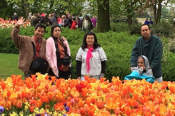 Amsterdam: Keukenhof Tulip Gardens and Giethoorn with Boat Tour - Giethoorn: Canal Life, Bridges, and That Road-Free Feeling
