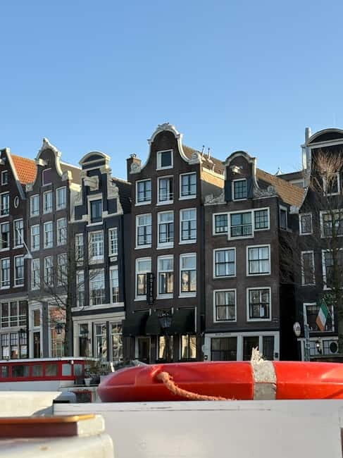 Amsterdam: Kultour, Kulturelle Stadtführung mit Herz & Seele - Meeting at Beursplein/Damrak: the start that gets you moving fast