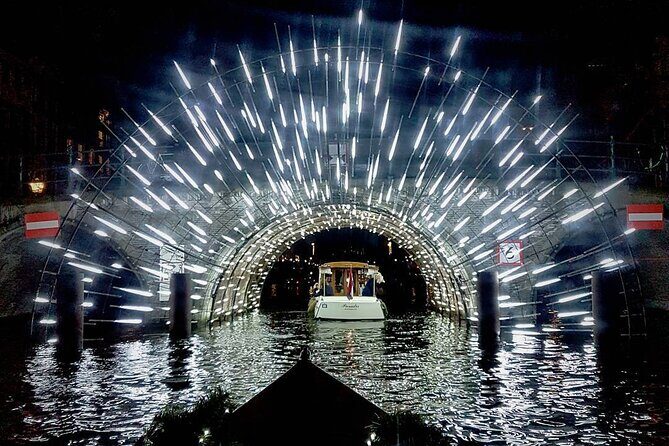 Amsterdam Light Festival: Canal Cruise + Snack & Unlimited Drinks - The boat setup: comfort helps, but “covered” affects visibility