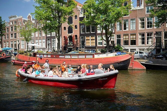 Amsterdam Light Festival: Saloon Boat Cruise + Hot Drinks & Bite - Amsterdam Light Festival from the water: what the 75 minutes is really like