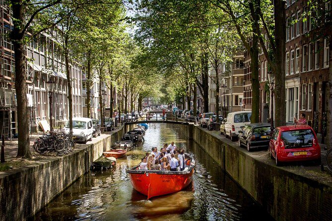 Amsterdam Light Festival: Saloon Boat Cruise + Hot Drinks & Bite - A realistic look at the Amsterdam Light Festival stops