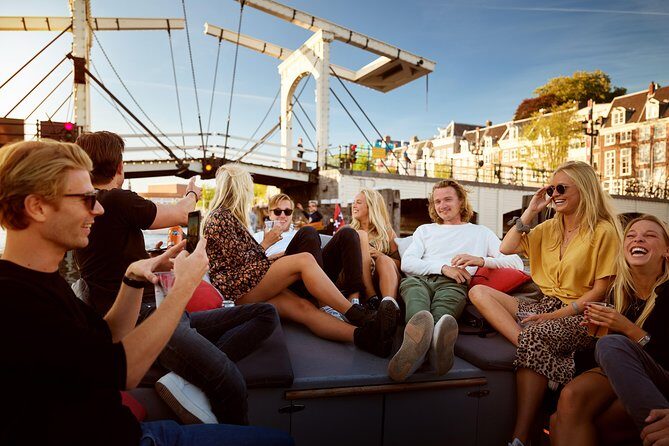Amsterdam Light Festival: Saloon Boat Cruise + Hot Drinks & Bite - Where you board: National Maritime Museum and a smooth start