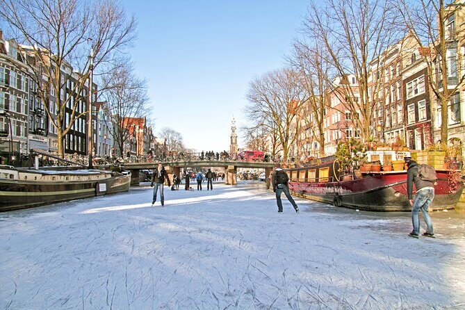 Amsterdam Light Festival Winter Walk with Stroopwafel Workshop - Dam Square To Canal Lights: The Overall Vibe