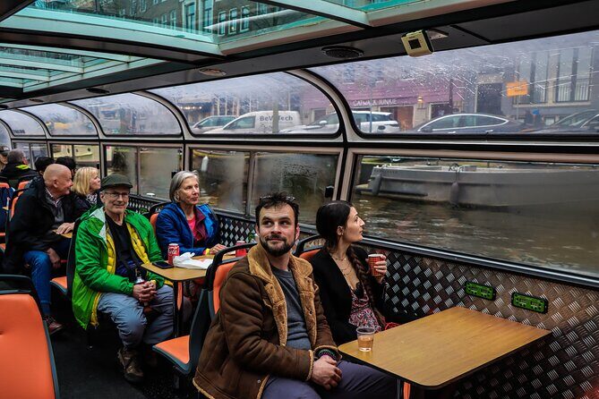 Amsterdam Live Guided Sightseeing Canal Cruise - Where to Meet and How the Boat Experience Feels