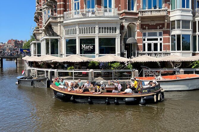 Amsterdam Luxury Boutique Boat tour with Unlimited Beer and Wine - Oude Kerk: Amsterdam’s oldest church as a live landmark